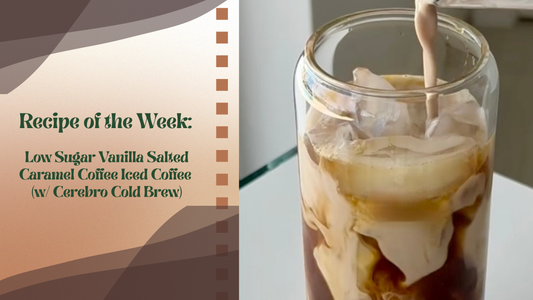 Glass of iced coffee with layers of vanilla almond milk, Cerebro mushroom cold brew, and sugar-free salted caramel syrup on a summer kitchen counter.